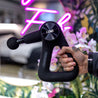 Lumi powerPro Massage Gun with hand